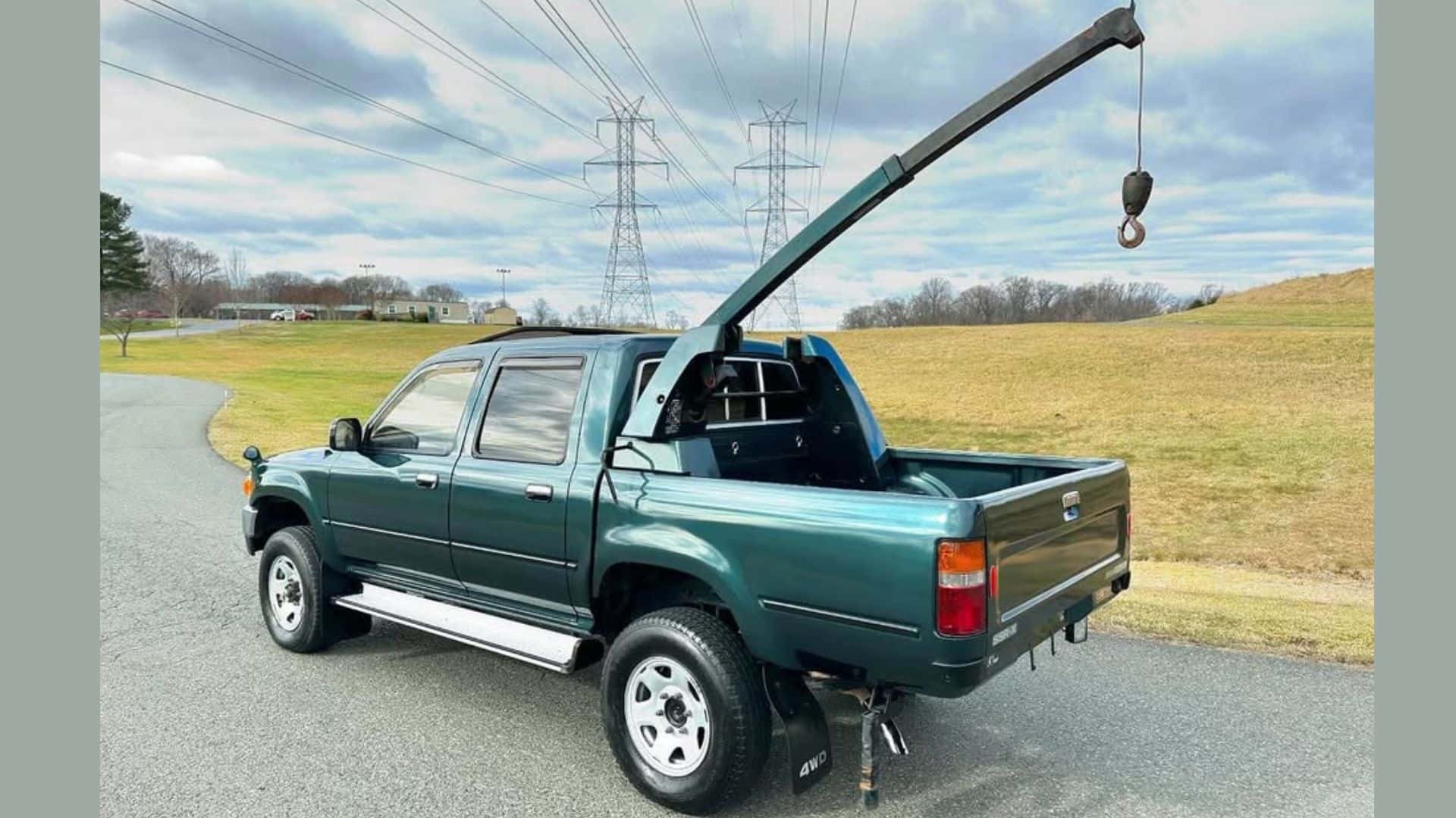 Toyota Hilux with a Crane.jpg