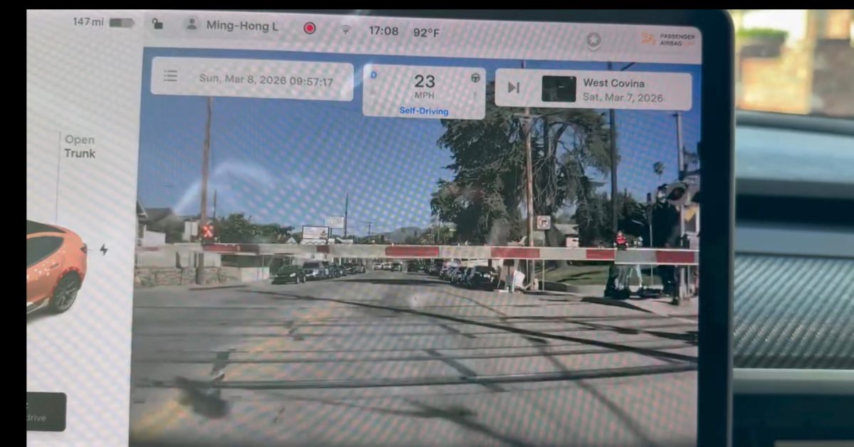 Tesla Full Self Driving Drive Through Train Crossing Barrier.jpg