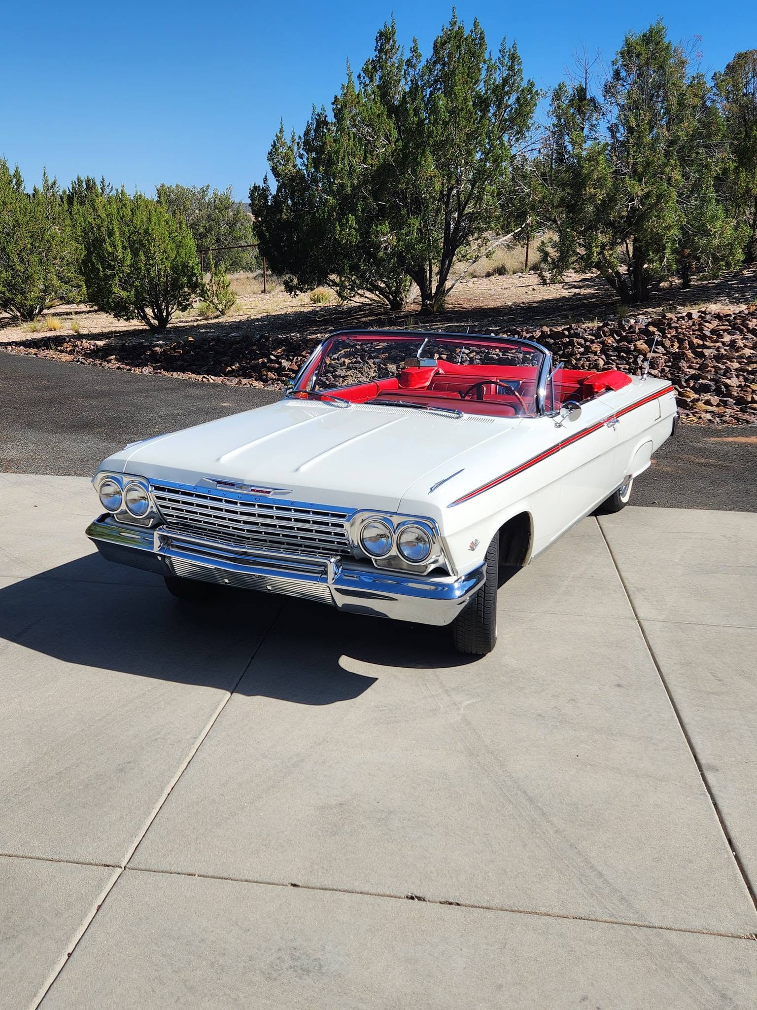 Couple Honeymooned in a 1962 Impala Ragtop Celebrated 62 Years of Marriage in an Identical Survivor.jpeg